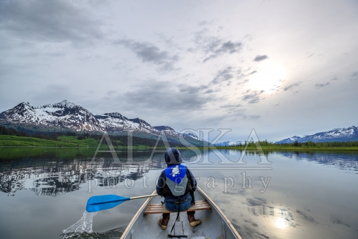Boy Canoes in Robe Lake